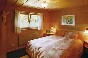 Schlafzimmer im Ferienhaus - Ferienwohnungen Kiening in Tegernsee